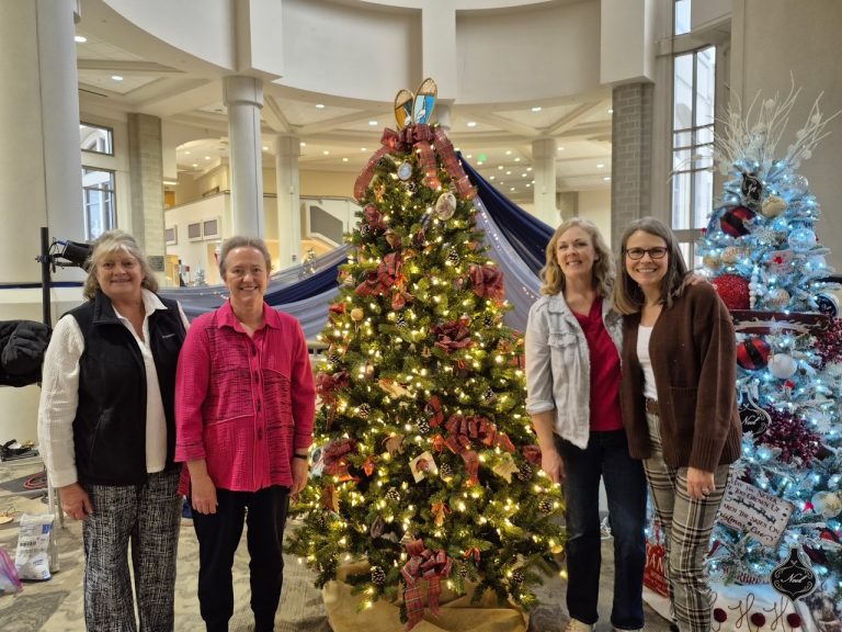 Pictured left to right Jan Flandro, Joanne Tokle, Lisa Jorgensen, and Cristine Casselman, Chairperson of the ‘“Knotty by Nature” tree project